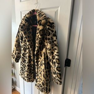 Beautiful leopard print soft furry jacket.  Great for the winter time!